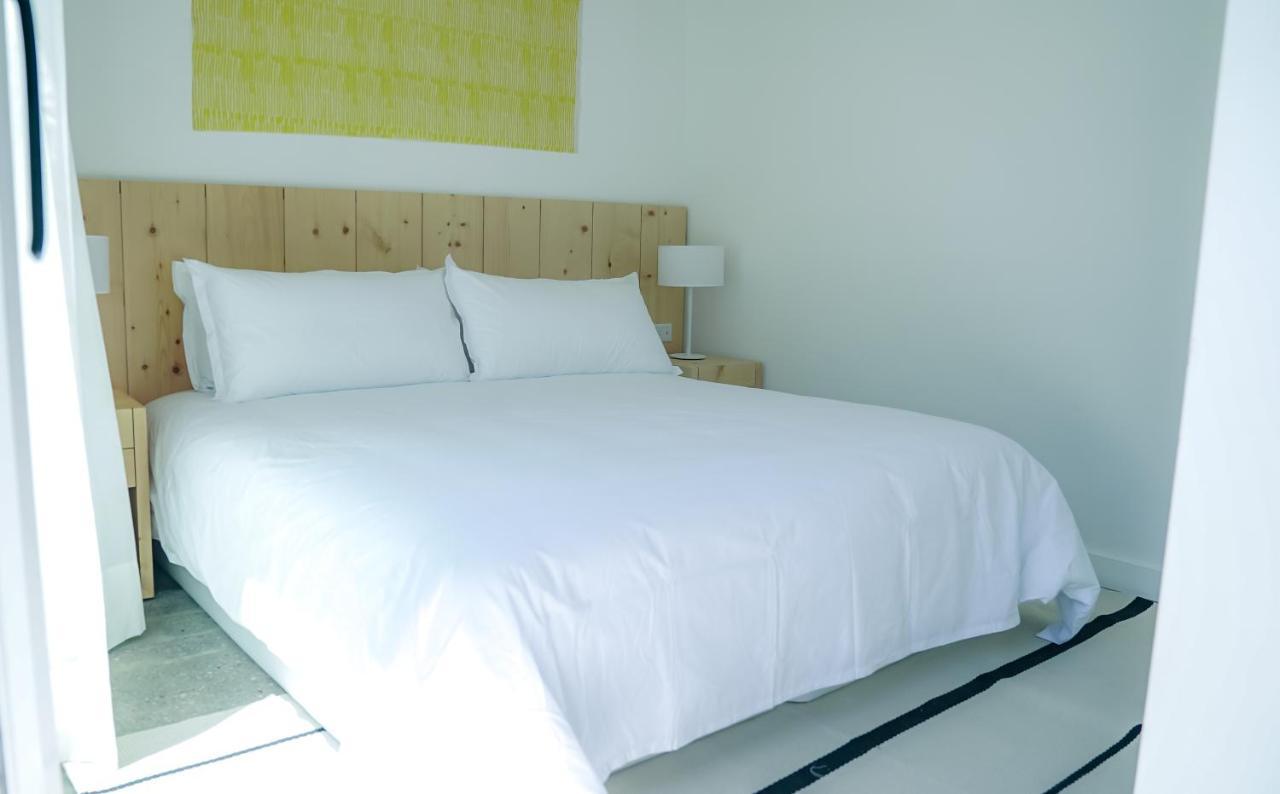 Casagrande Hotel & Beach Club Хосе-Игнасио Экстерьер фото A bed with a duvet